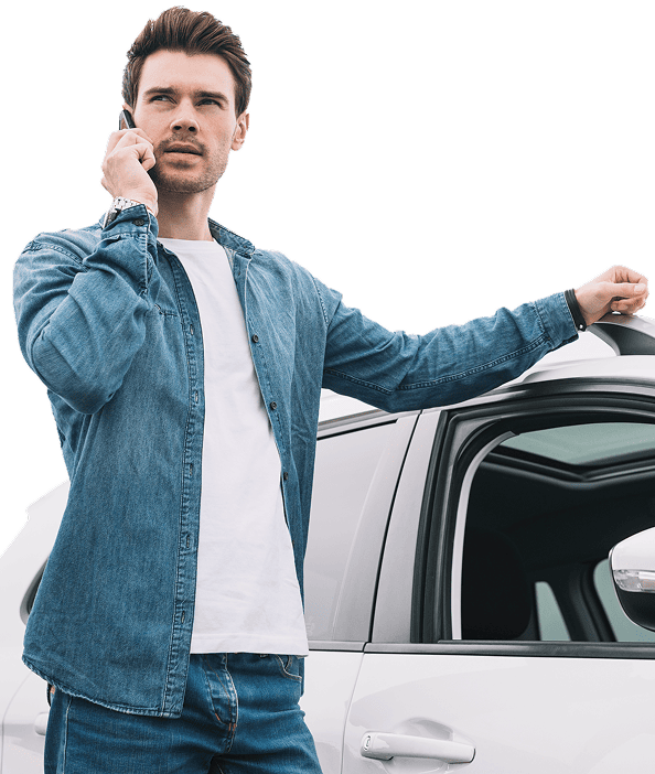handsome man standing near car talking cellphone 2 1 1